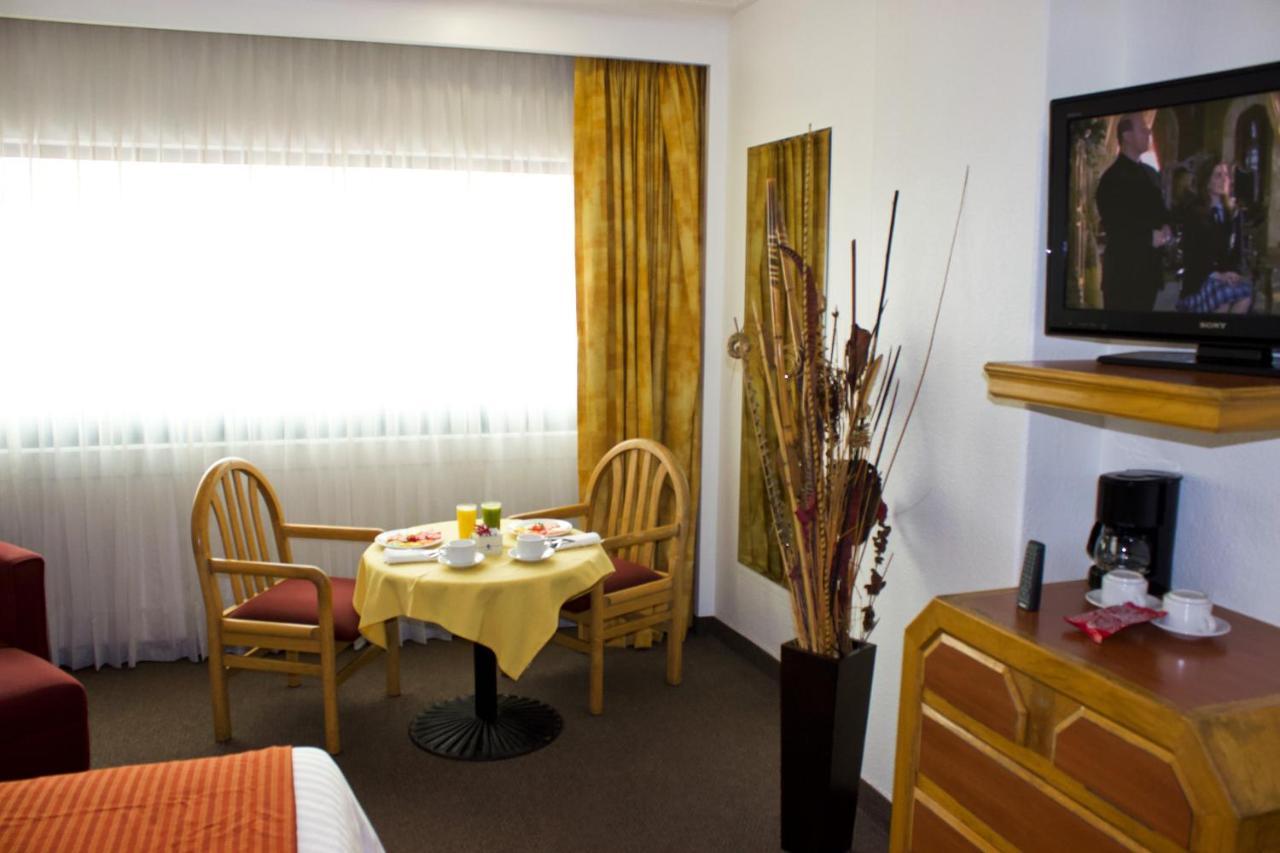 San Juan Park Hotel San Juan del Río Εξωτερικό φωτογραφία A room at the hotel